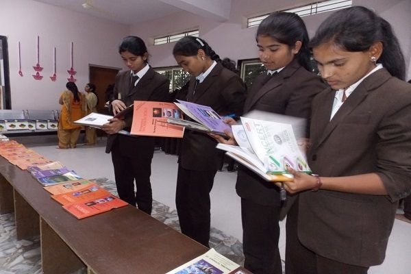Students with books and journals